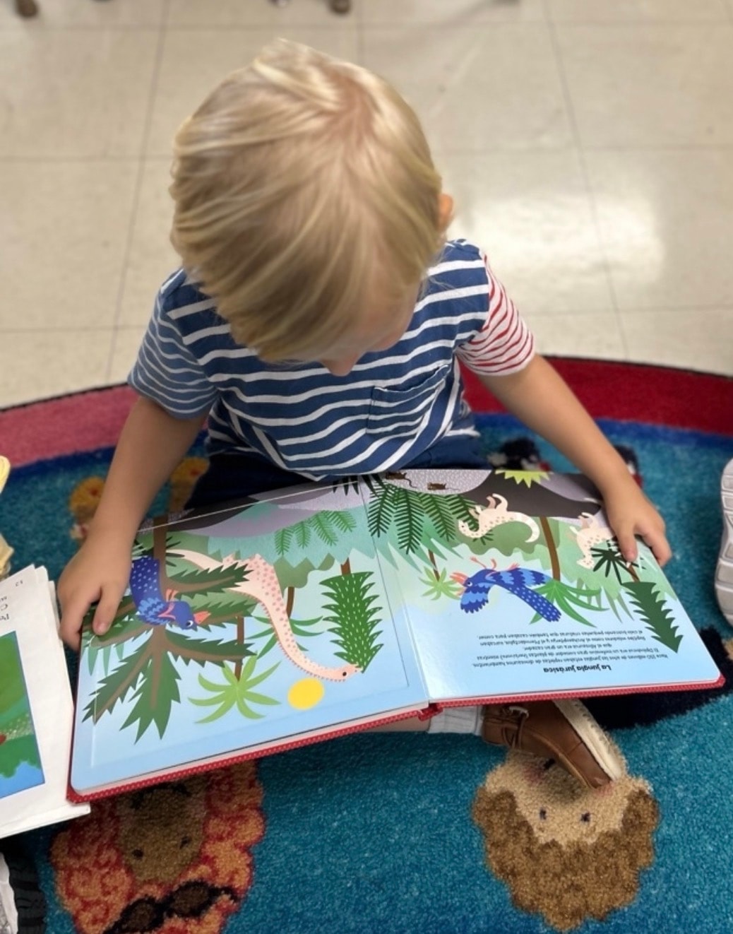 Child reading at My Spanish Academy